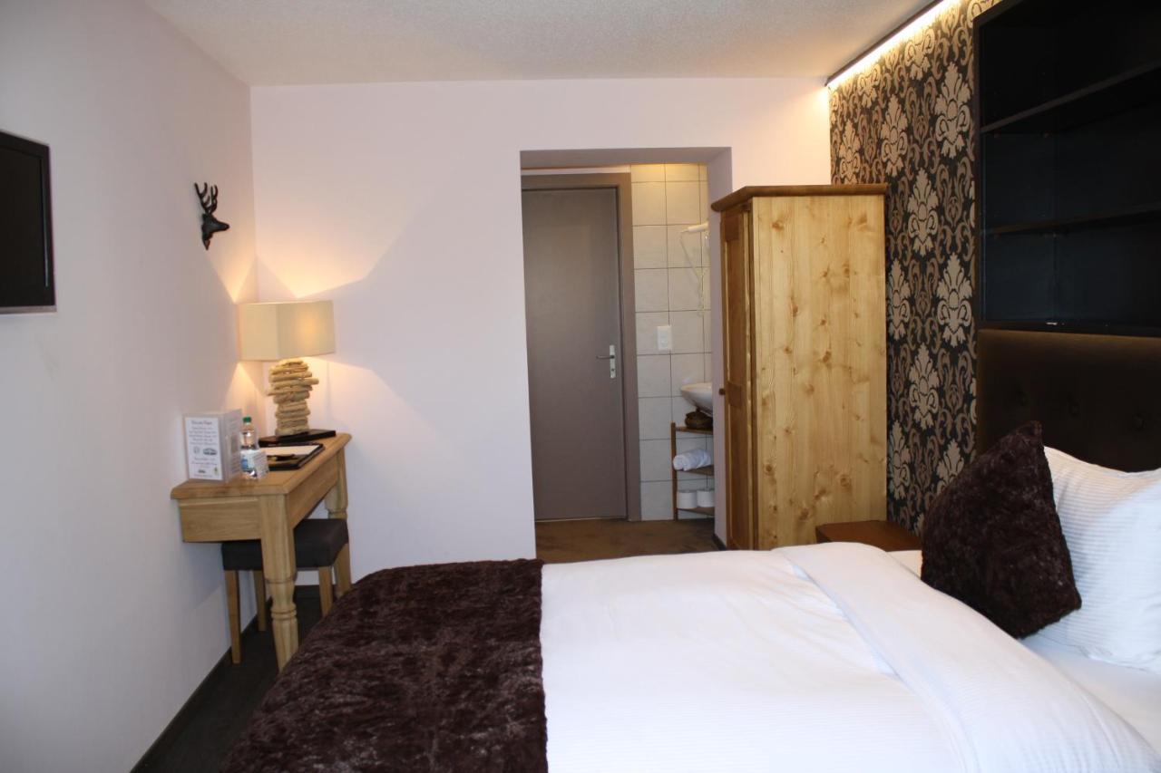 Hotel De La Gare Monthey Exterior photo